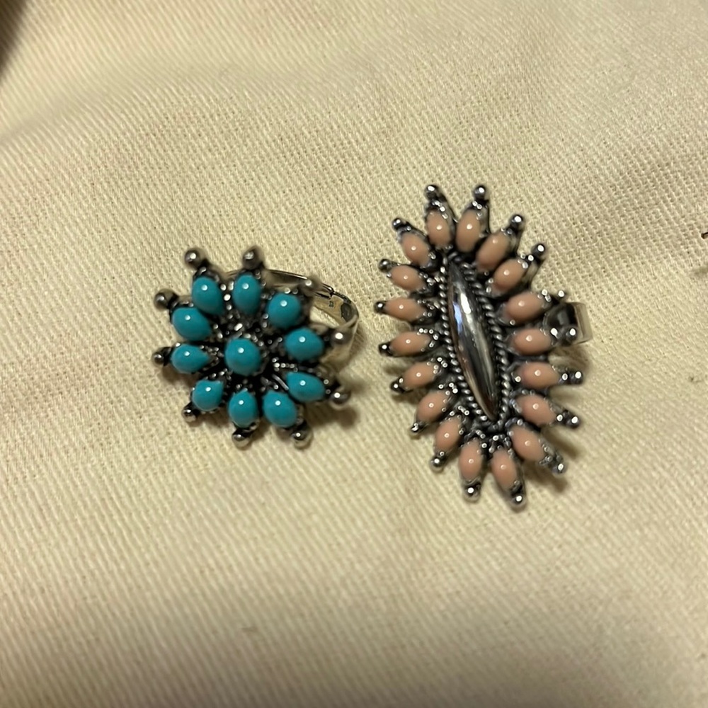 Pair of silver adjustable rings